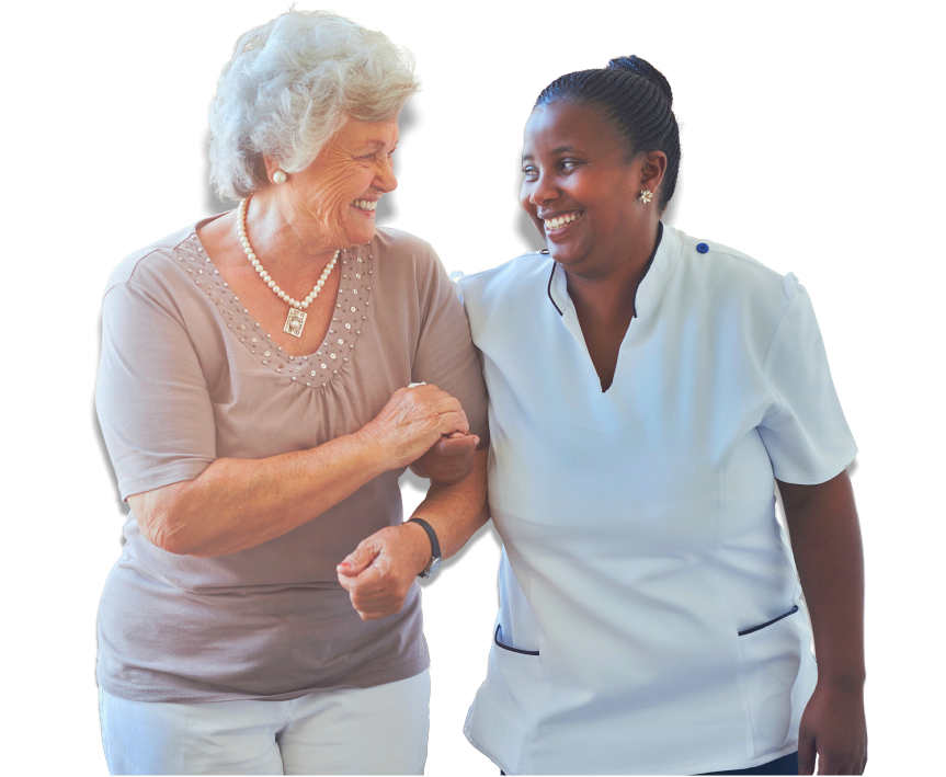 senior woman and caregiver smiling